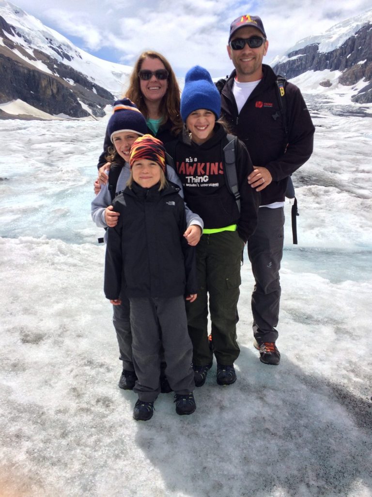 Greg Hawkins with his family